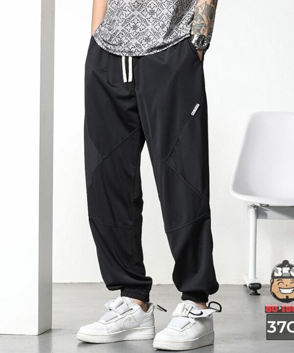 Quần dài jogger kẻ xiêng thun mềm chấp nối cá tính 1