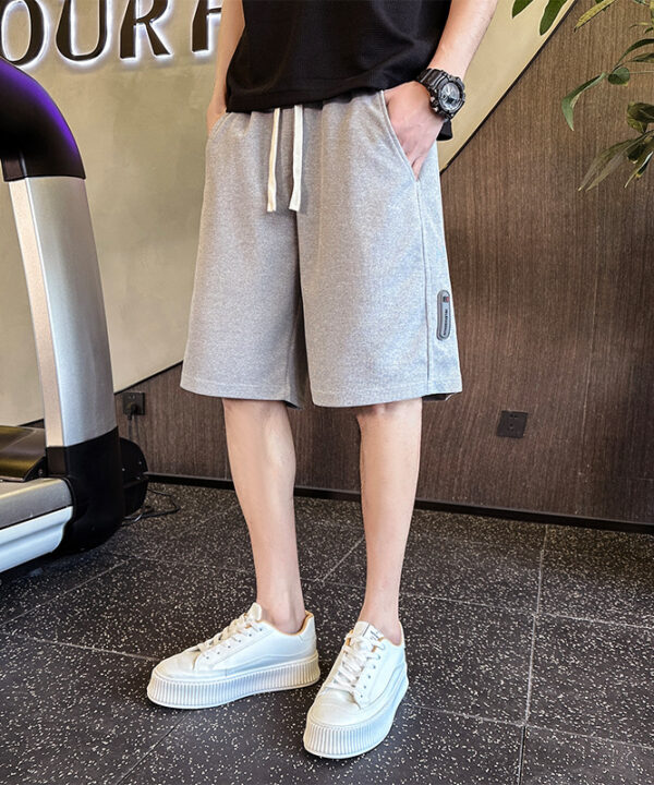 Alternative view of Quần ngắn thun thể thao sọc hông logo basic