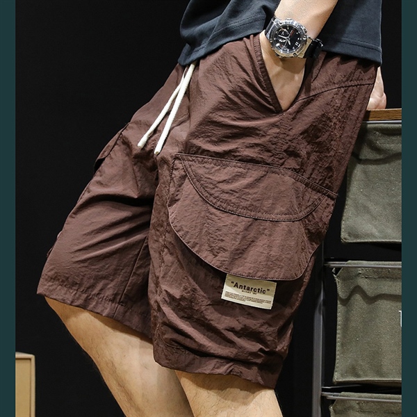 Quần ngắn thun dù short túi hợp vòng cung nhúng nhầu