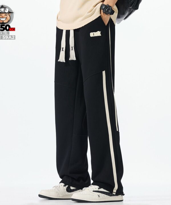 Alternative view of Quần dài jogger ống đa năng sọc đứt bên hông cá tính