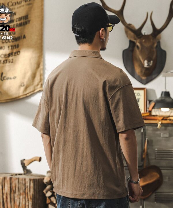 Áo thun tay ngắn Polo họa tiết chỉ nổi ráp phối túi khóa cá tính 3