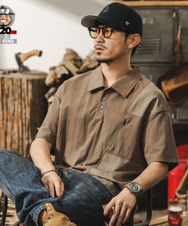 Áo thun tay ngắn Polo họa tiết chỉ nổi ráp phối túi khóa cá tính