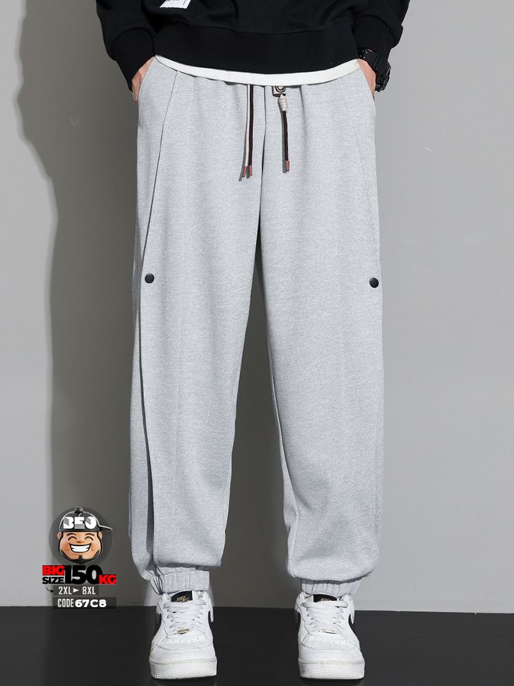 Quần dài jogger ống túm phối các đường sọc dọc năng động 4 Quần dài jogger ống túm phối các đường sọc dọc năng động - Ảnh 4