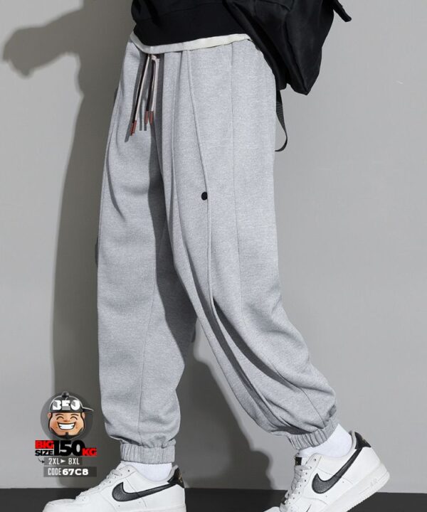 Quần dài jogger ống túm phối các đường sọc dọc năng động