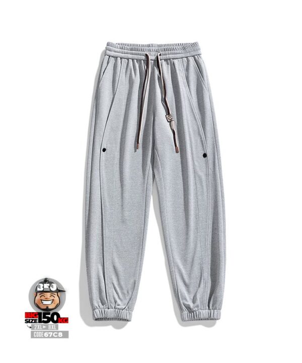 Quần dài jogger ống túm phối các đường sọc dọc năng động 9 Quần dài jogger ống túm phối các đường sọc dọc năng động 4