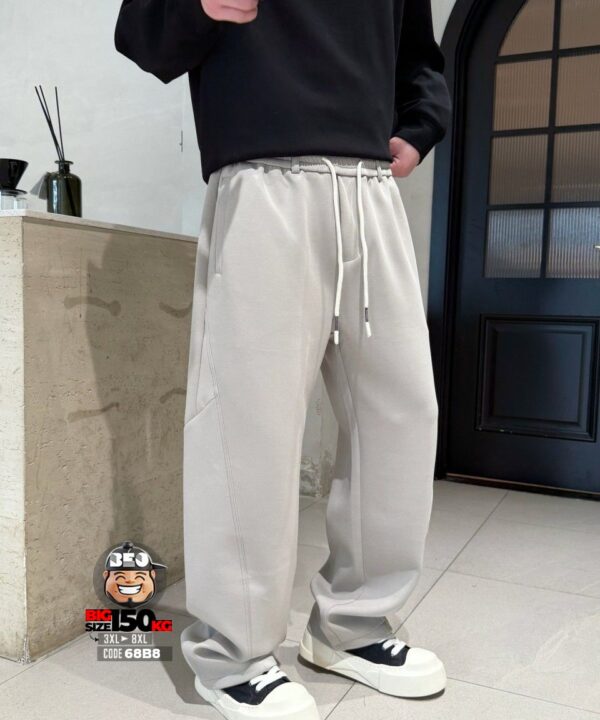 Quần dài jogger thun chỉ mãng ghép ống rộng xéo gối tibe band style