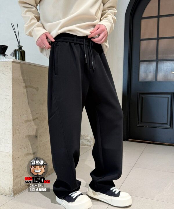 Alternative view of Quần dài jogger thun chỉ mãng ghép ống rộng xéo gối tibe band style